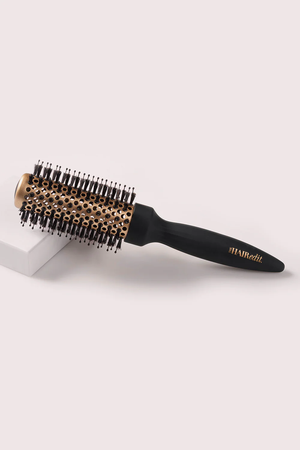 round-hair-brush-for-perfect-blowouts.png