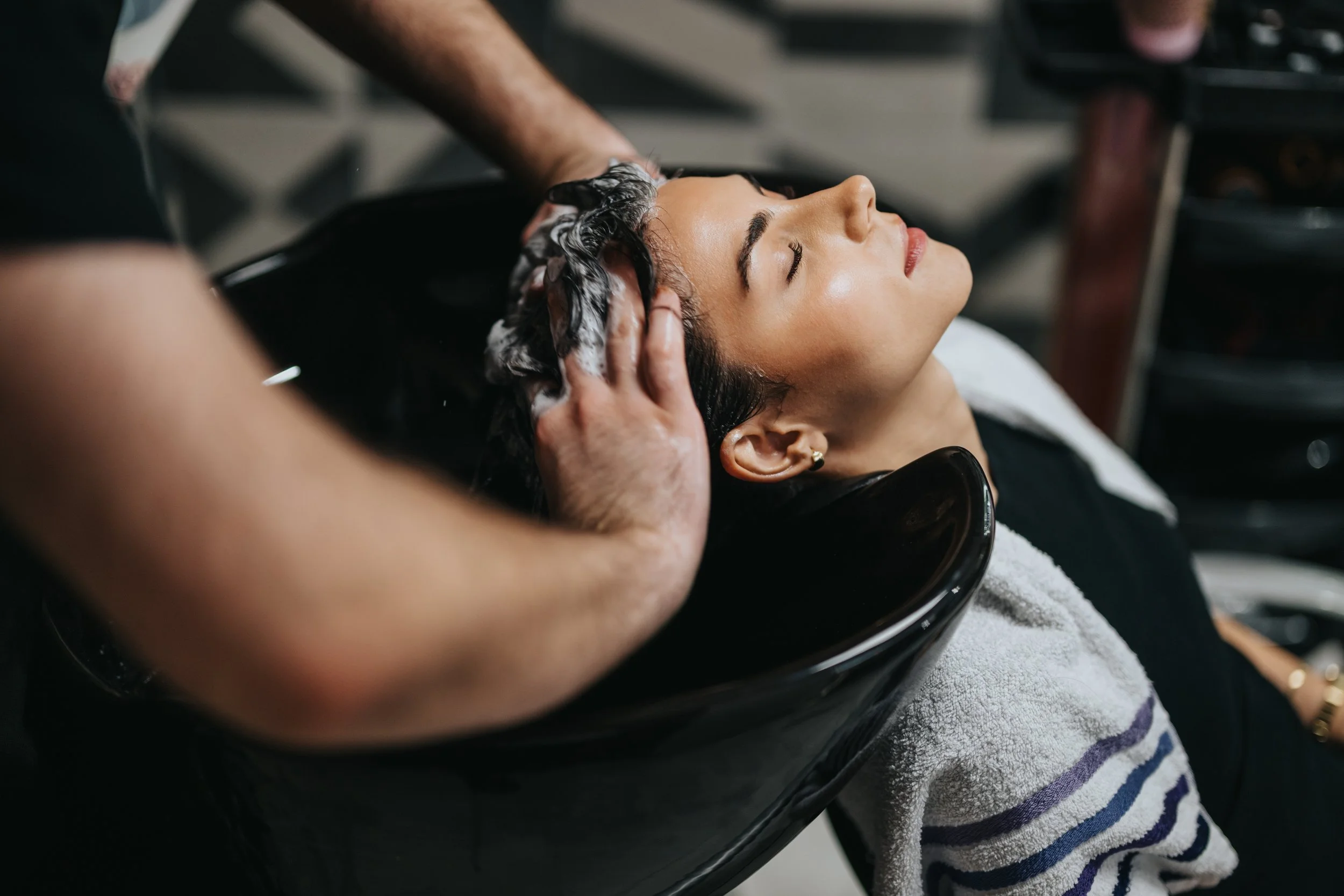 Luxury scalp treatment service focused on removing buildup and soothing dryness at LOOK Salon San Antonio