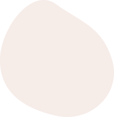 A plain, light-colored, irregular-shaped object on a black background.