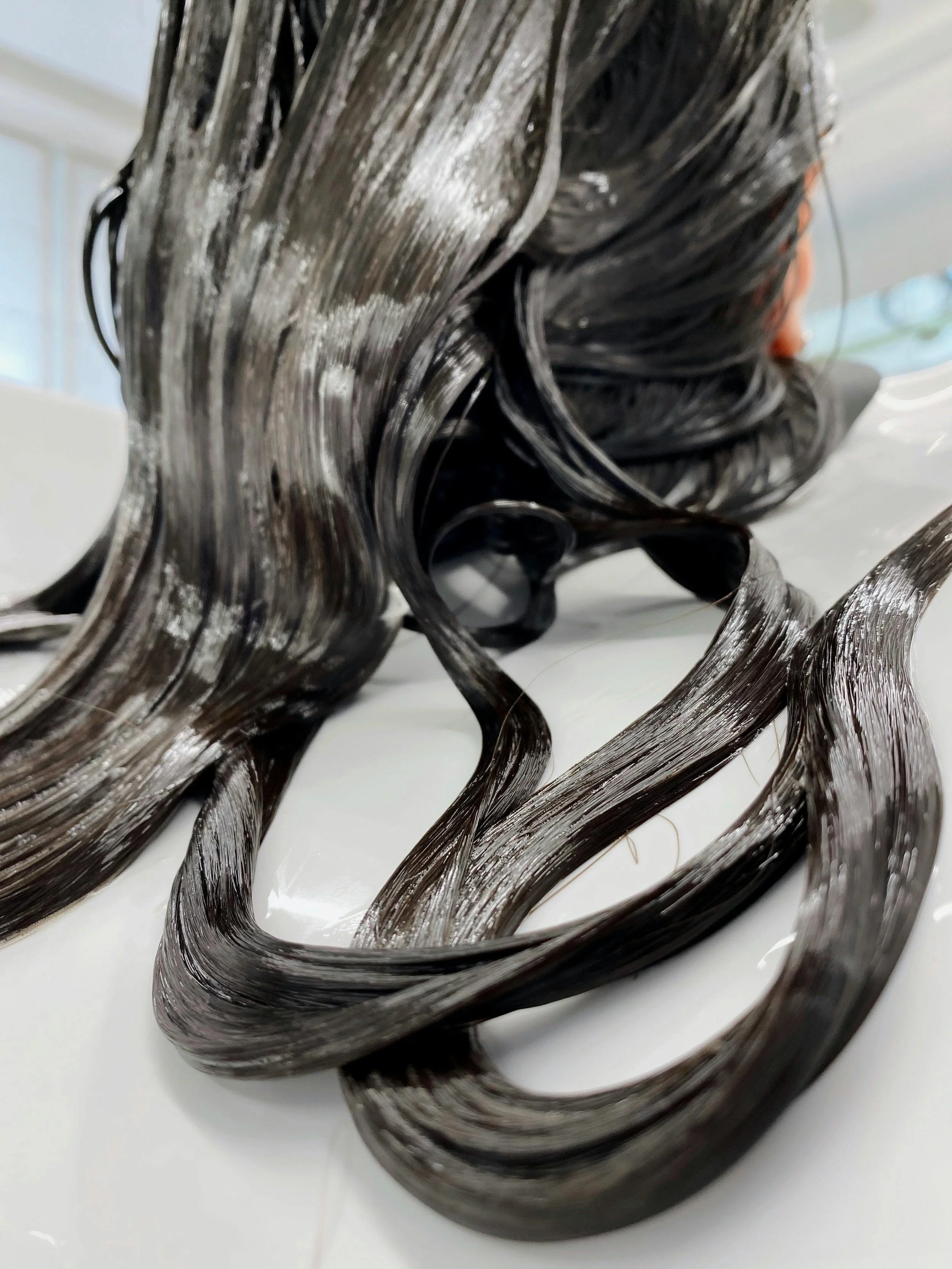 3. Cool, brass-free blonde with a high-shine finish from a luxury salon in San Antonio