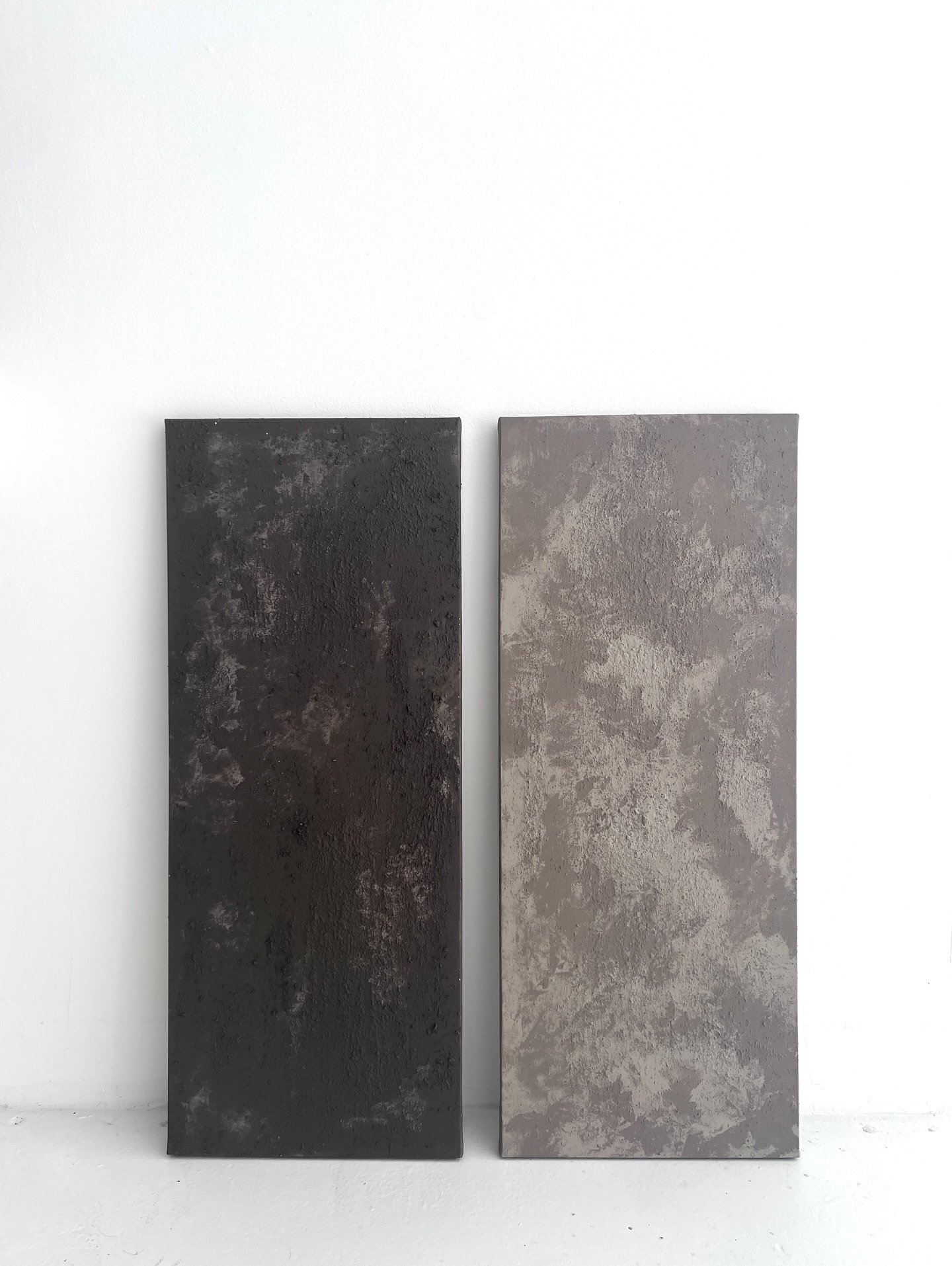 A reflection on the acceptance of all that is. One panel, in deep brown and earth tones, embodies the weight of what has been; the other, in paler grey tones, evokes release and reconciliation.
Amor Fati: Acrylic, Paver&rsquo;s Sand (quartz and limes