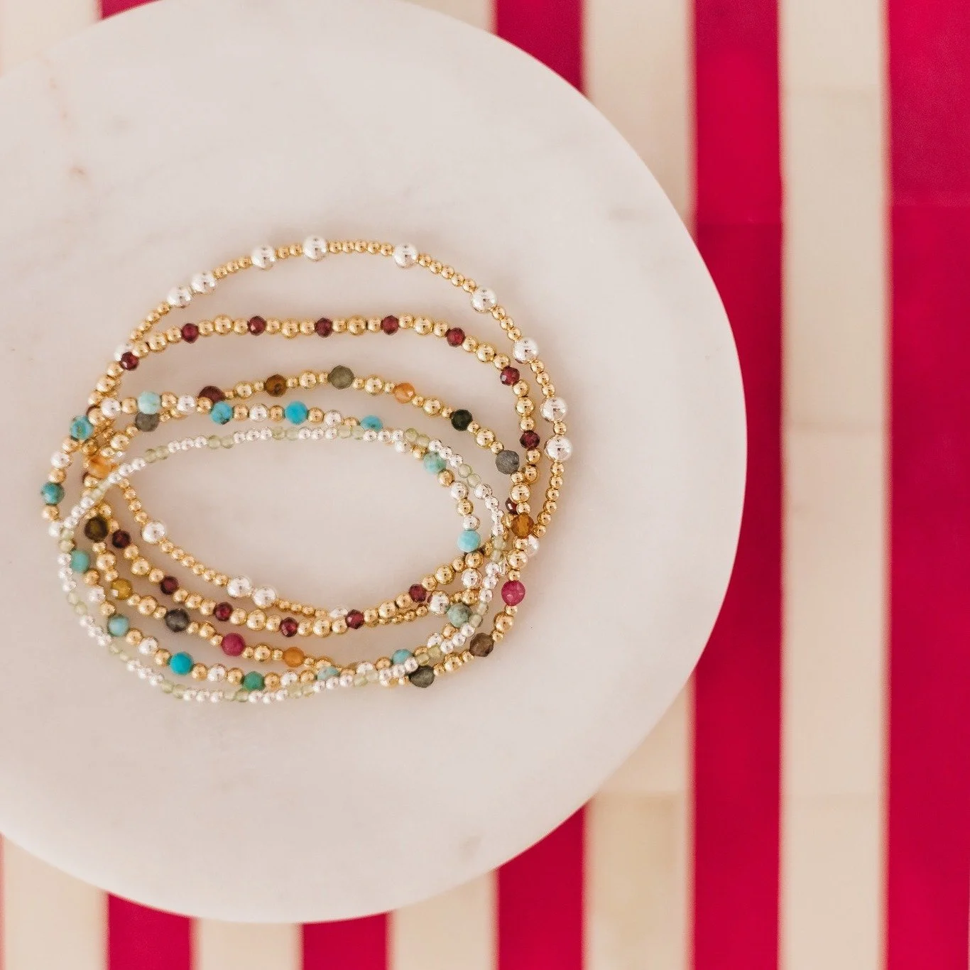 ✨ Our gold-filled and sterling silver *stretchies* make the sweetest personalized gift! Add birthstone gems for your kids or grandkids and create a piece they&rsquo;ll cherish. 
🎄 Get your custom order in now for Christmas!

#TheGreenvilleSpark #Per