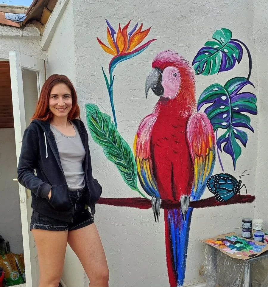 Fresque murale Le perroquet dans un décor tropical