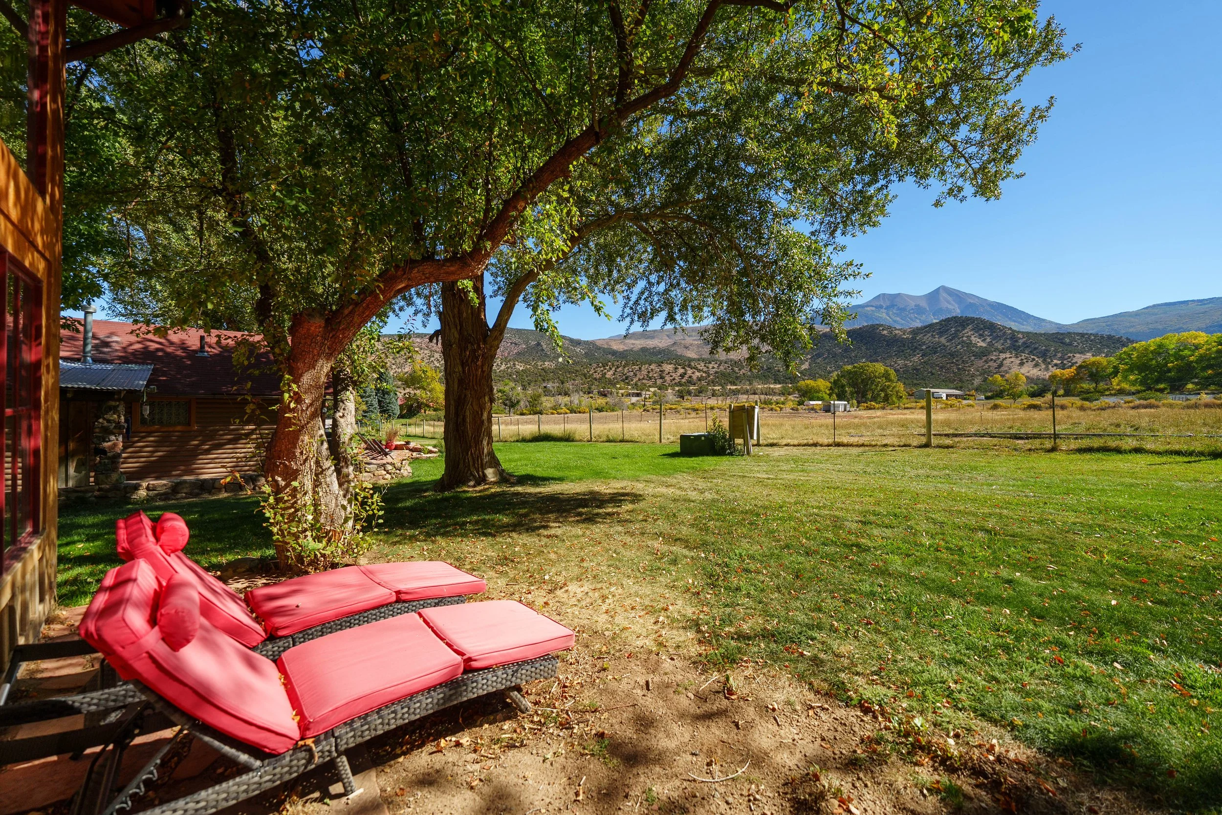 red-lawn-chairs-with-mountain-views.JPG