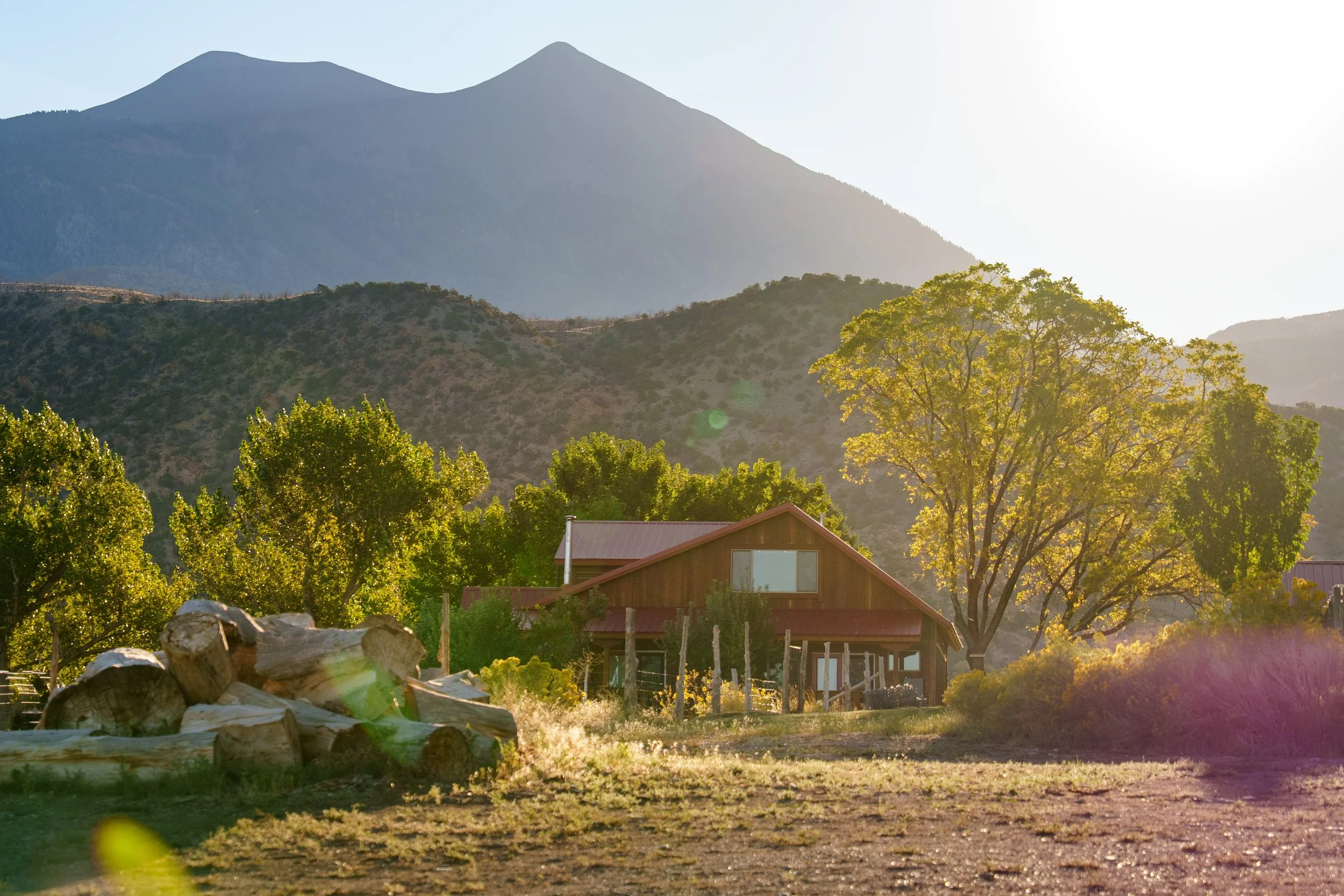 Goldenhour view of Pack Creek and surrounding mountain peaks.