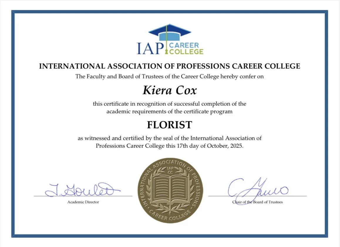 Certificate from the International Association of Professions Career College awarded to Kiera Cox for completing the floristry program, dated October 17, 2025, with signatures and an official seal.