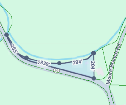 Map showing a section of Moore Branch Road and surrounding area with marked distances and routes.