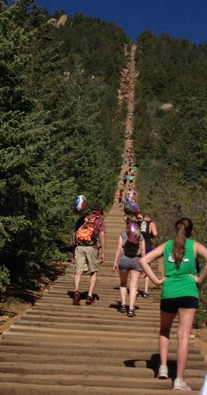 People climbing the stairs at the manitou Incline.