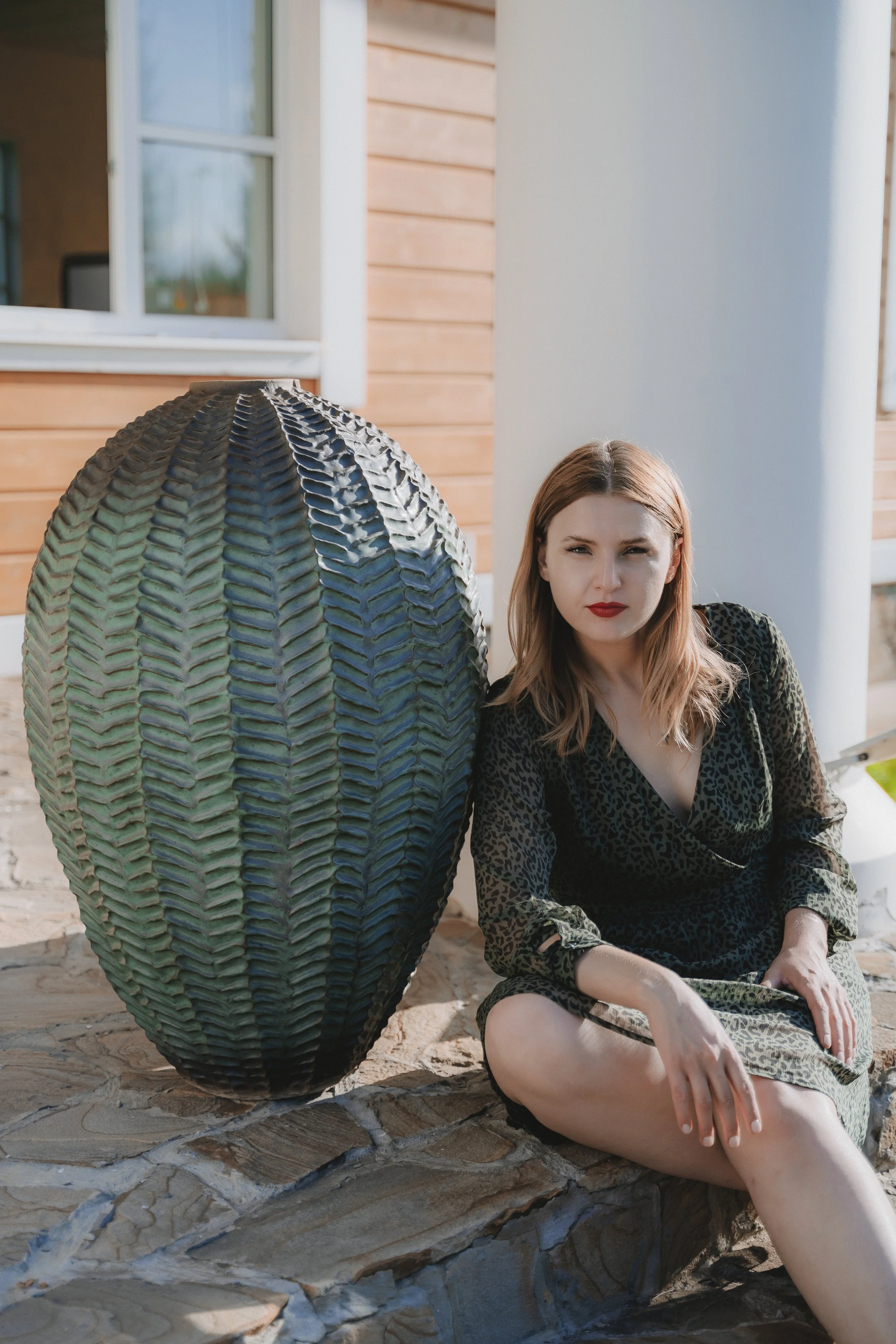 Artist and bronze pot.jpg