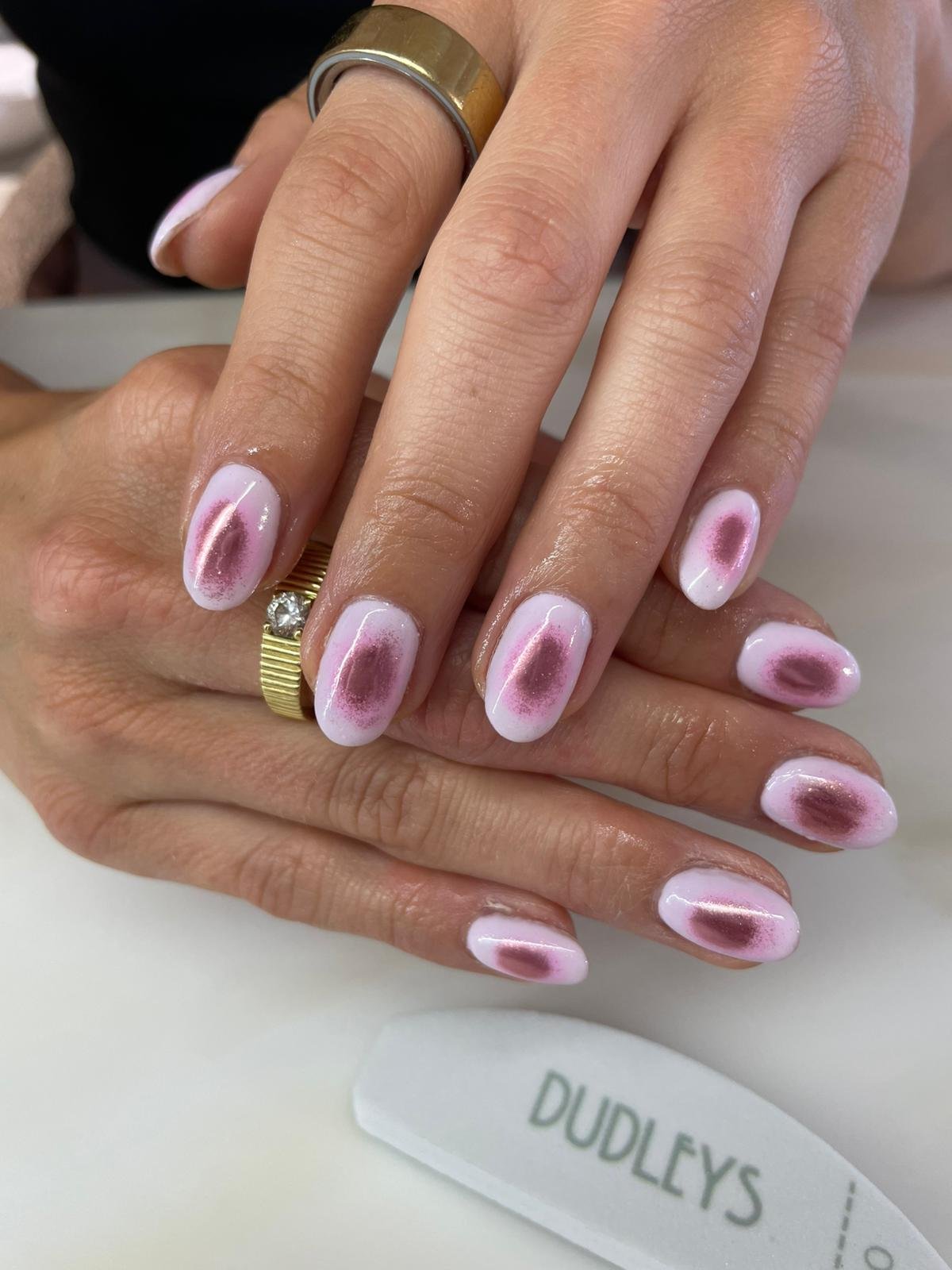ink cat eye nail art manicure with glossy gel finish
