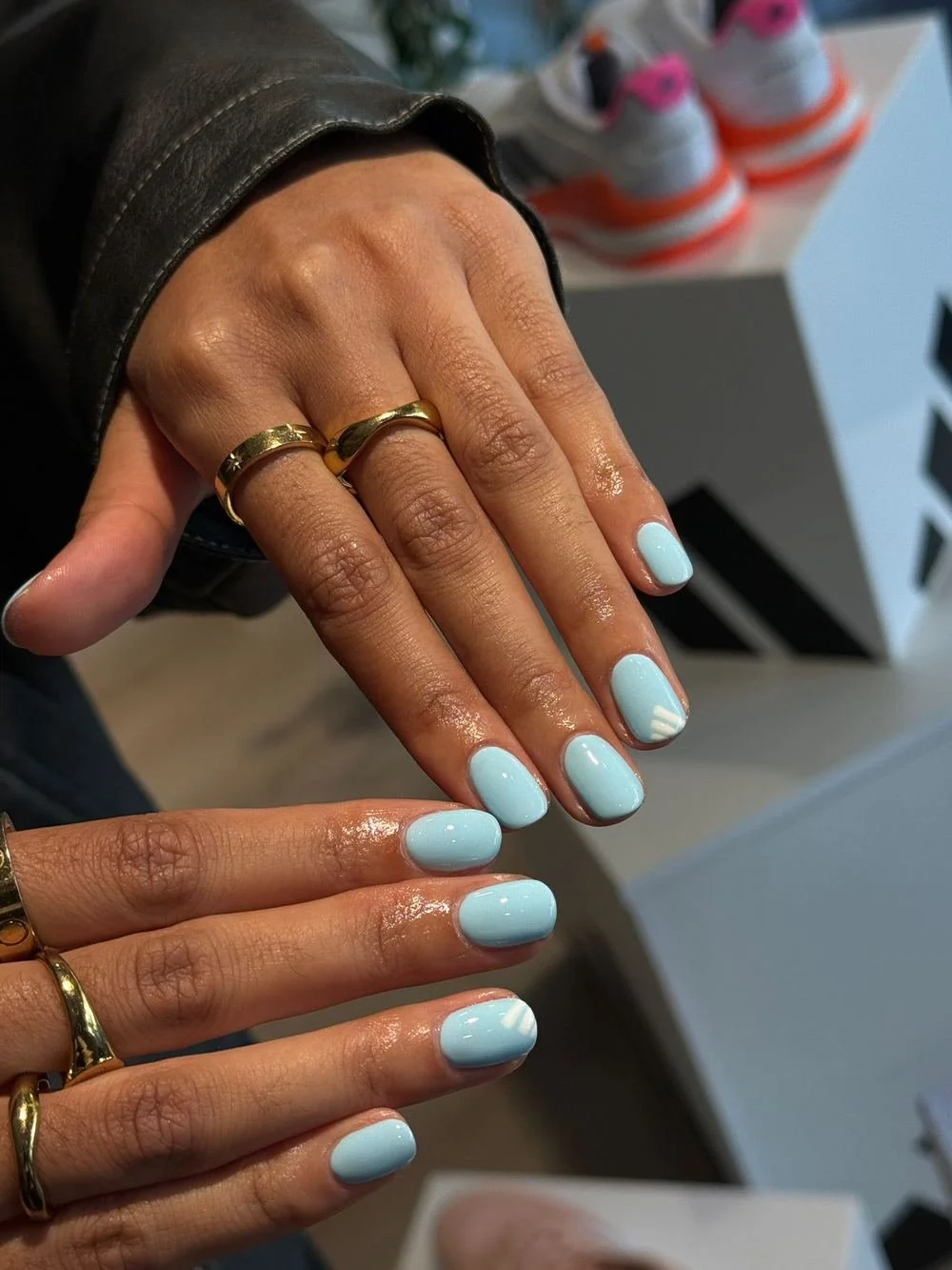 Blue logo manicure at Adidas Netcourt private nail event