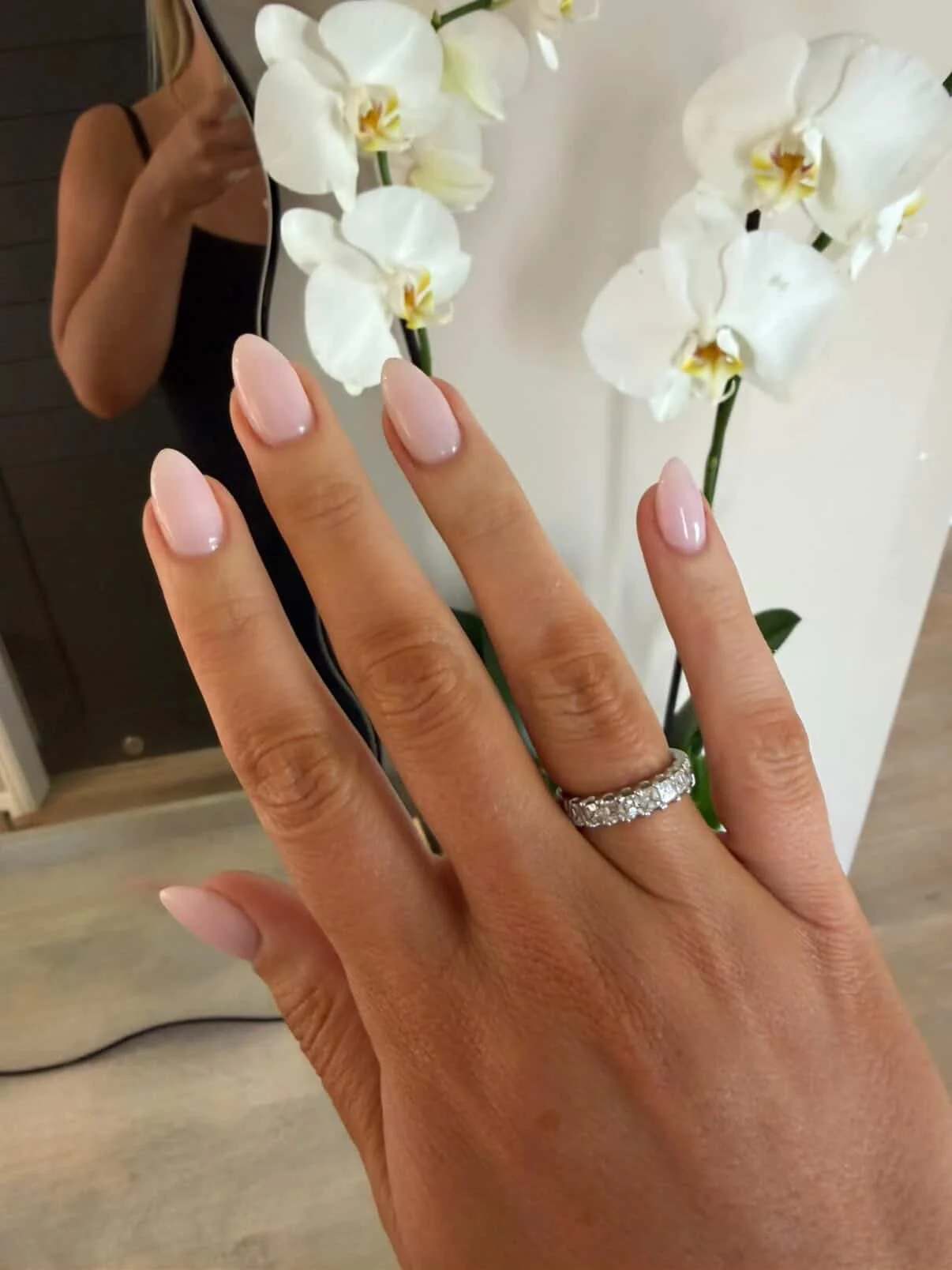 Soft pink almond gel nails with clean glossy finish
