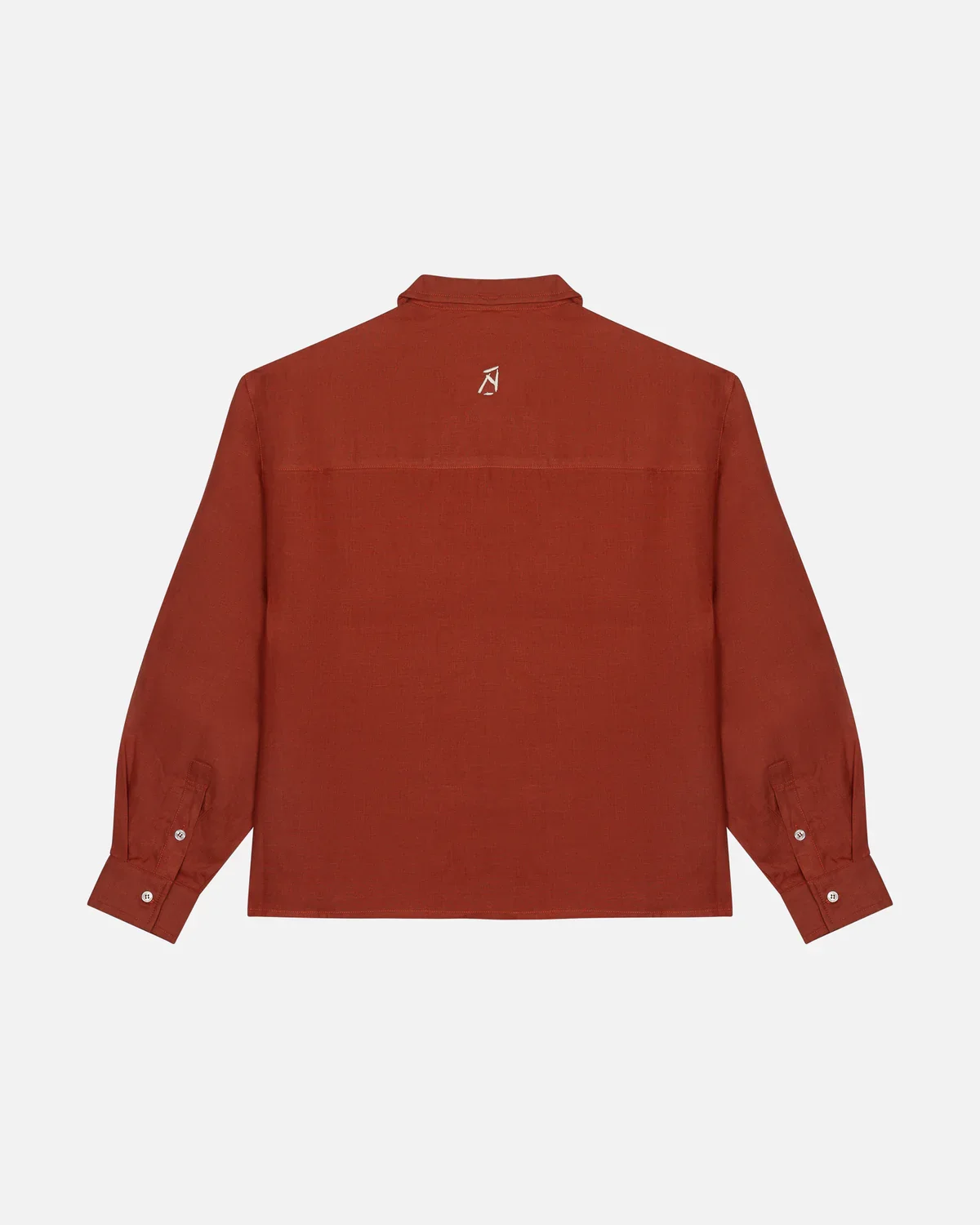 Back view of a long-sleeve, rust-colored shirt with a small logo on the upper back and buttoned cuffs.