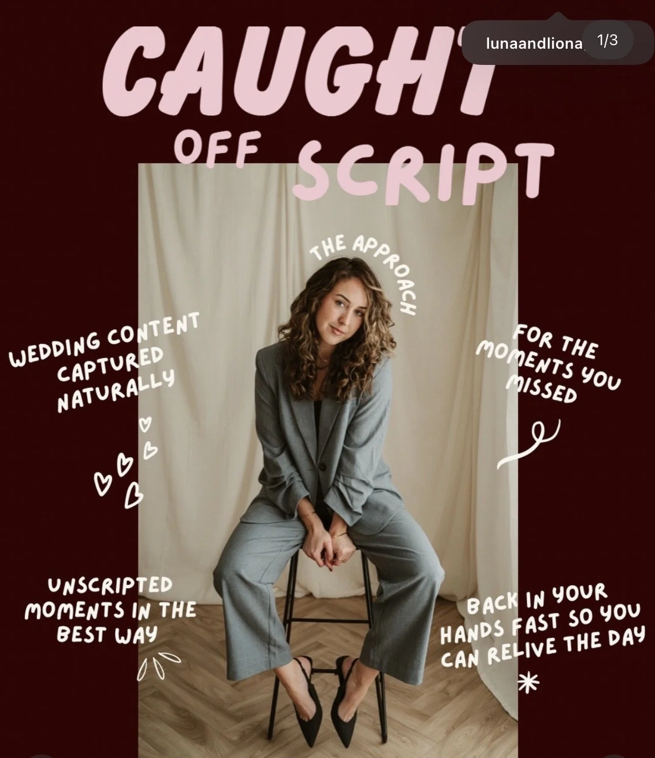 A woman with curly hair sitting on a stool in front of cream-colored curtains, wearing a gray blazer and matching pants, with black heels, surrounded by motivational handwritten-style texts and heart doodles on a dark red background.