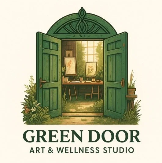 Open green door leading to an art studio with paintings, a desk, and a window with outdoor view.