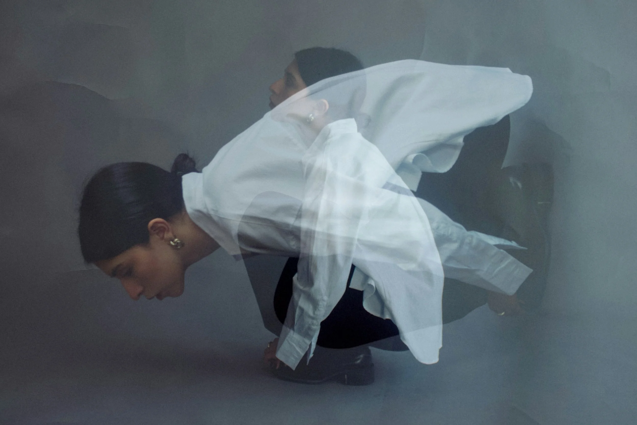 Person in motion blur mid-movement, illustrating the repeating self-override cycle