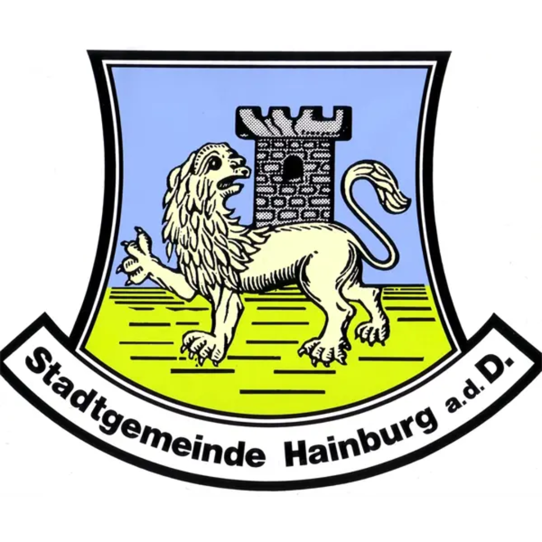 Municipal coat of arms featuring a unicorn with a lion's head and a tower, with the inscription "Stadtgemeinde Hainburg a.d.D" at the bottom.