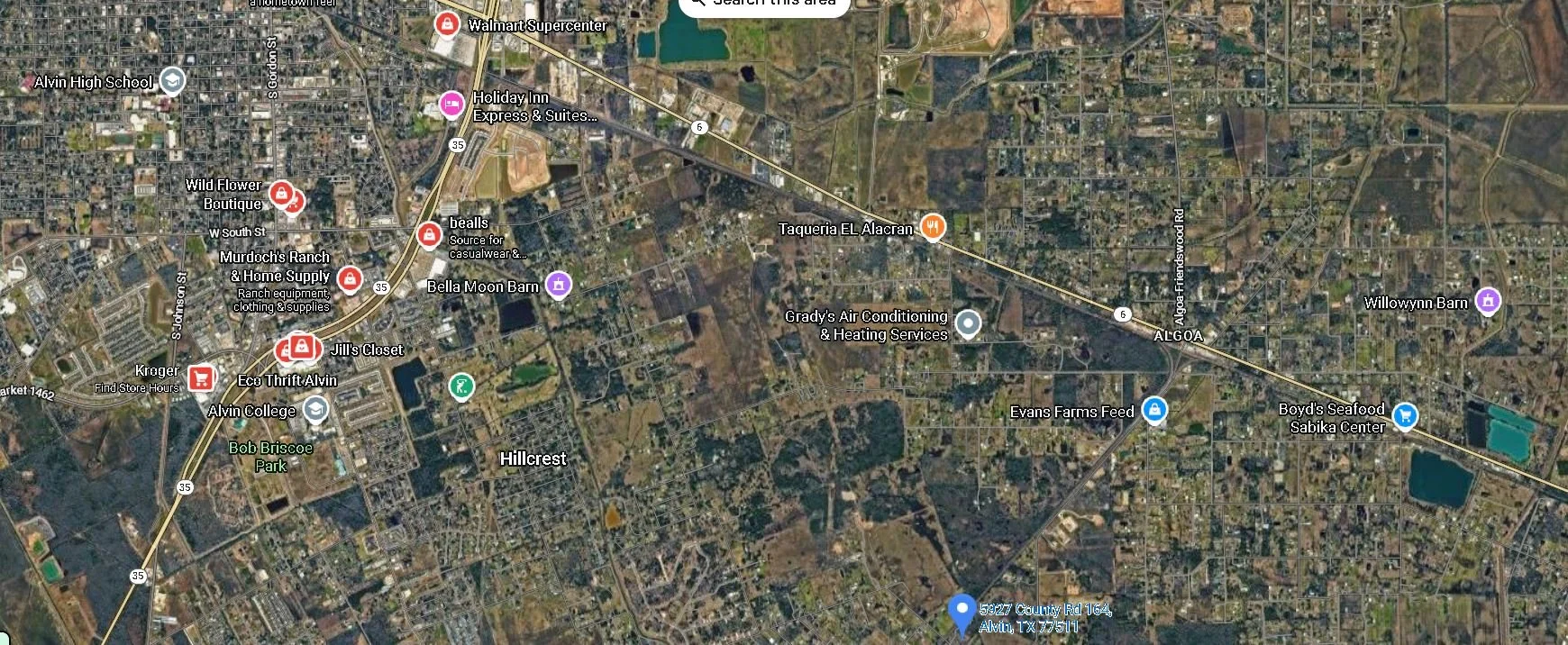 Satellite map showing the town of Alvin, Texas with various marked locations including businesses, parks, and landmarks.