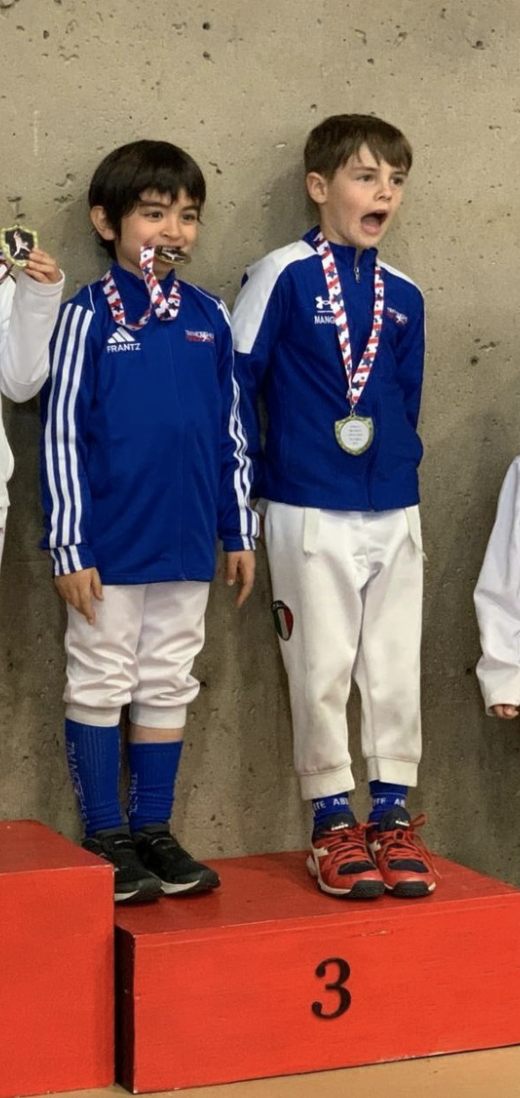 Ken and lorenzo medal.png