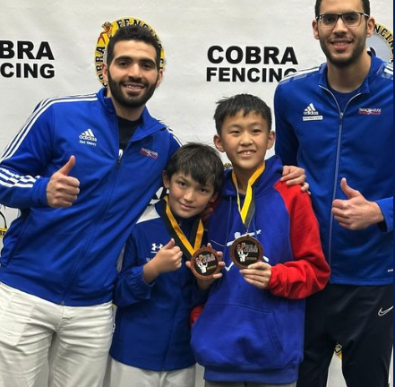 William and Zihou medal cobra.png