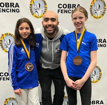 Emma and Anna Y10 WS medal saber.png