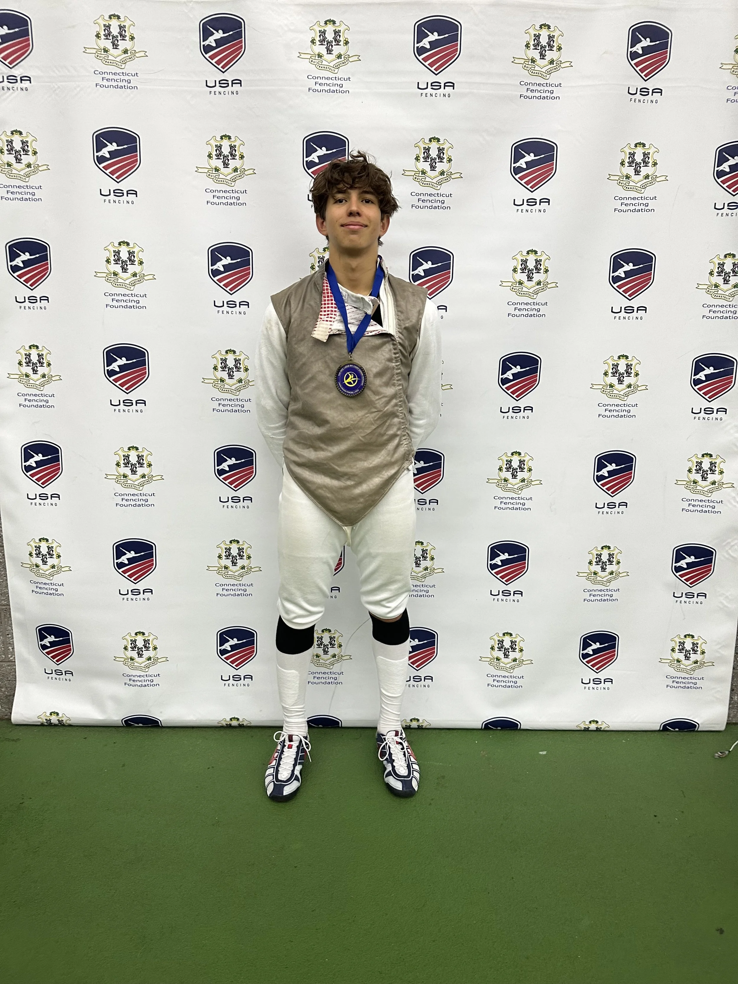 Philip Matakh medal neil lazar.jpeg