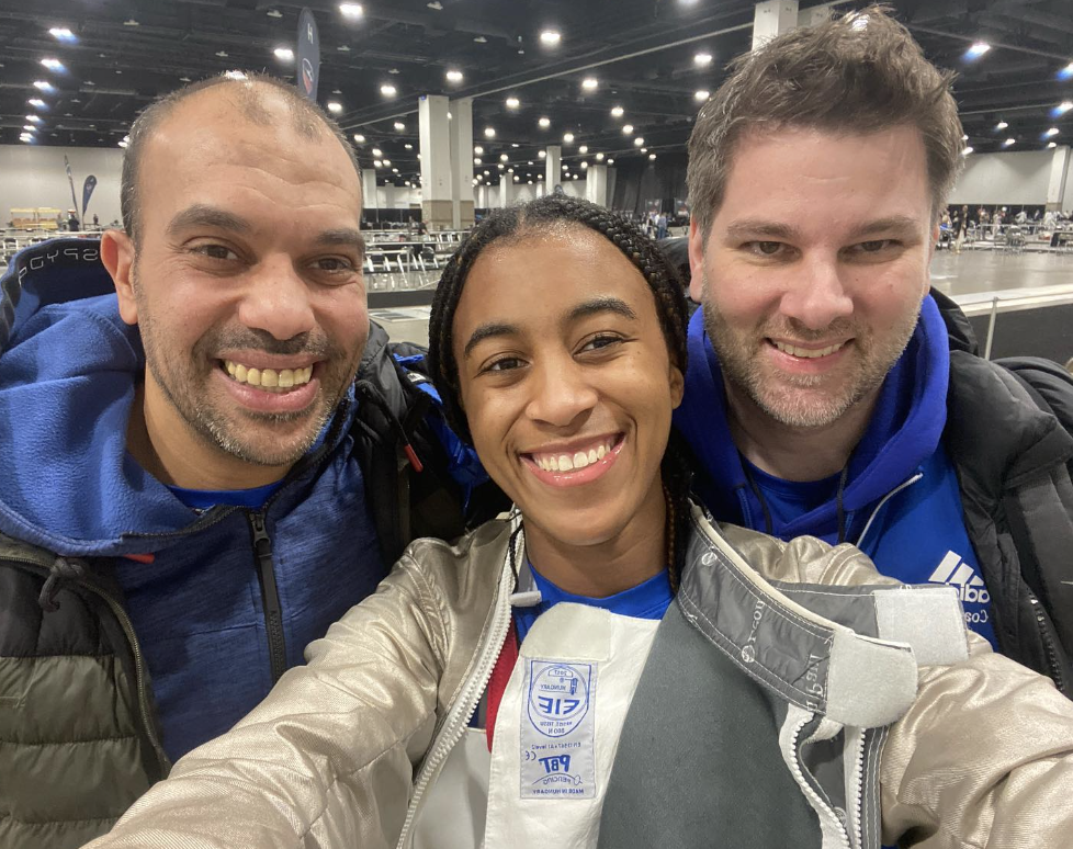 Madison Duckett and coaches JO.png