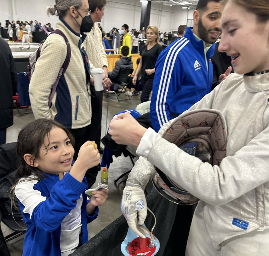 Mckee Anika Fist bump Cobra.png