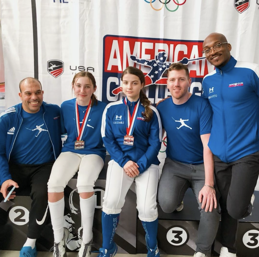 Ainsley Sophia AmChal Medals.png