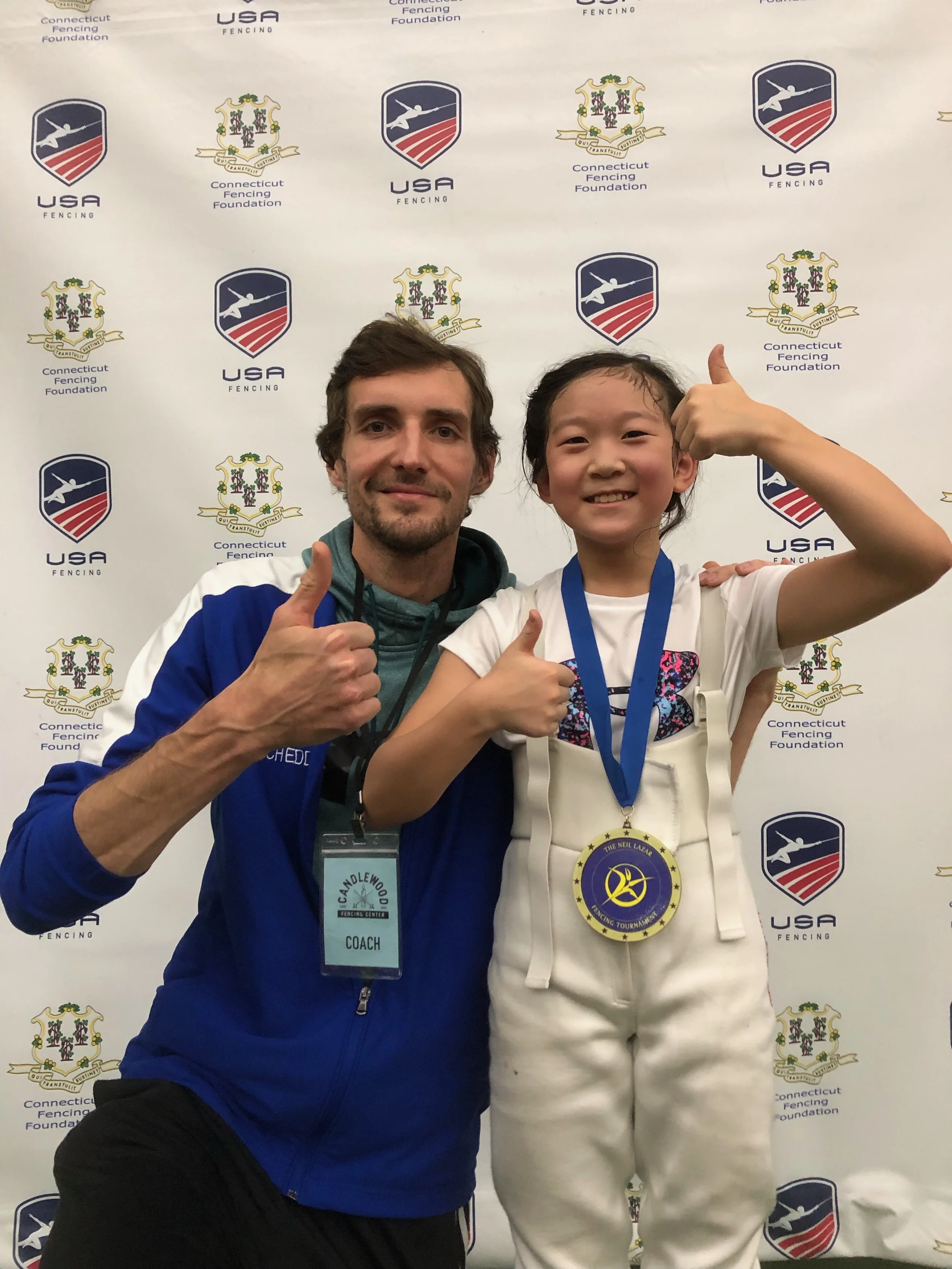 Amabel Wang and Coach Eddie Neil Lazar medal.jpeg