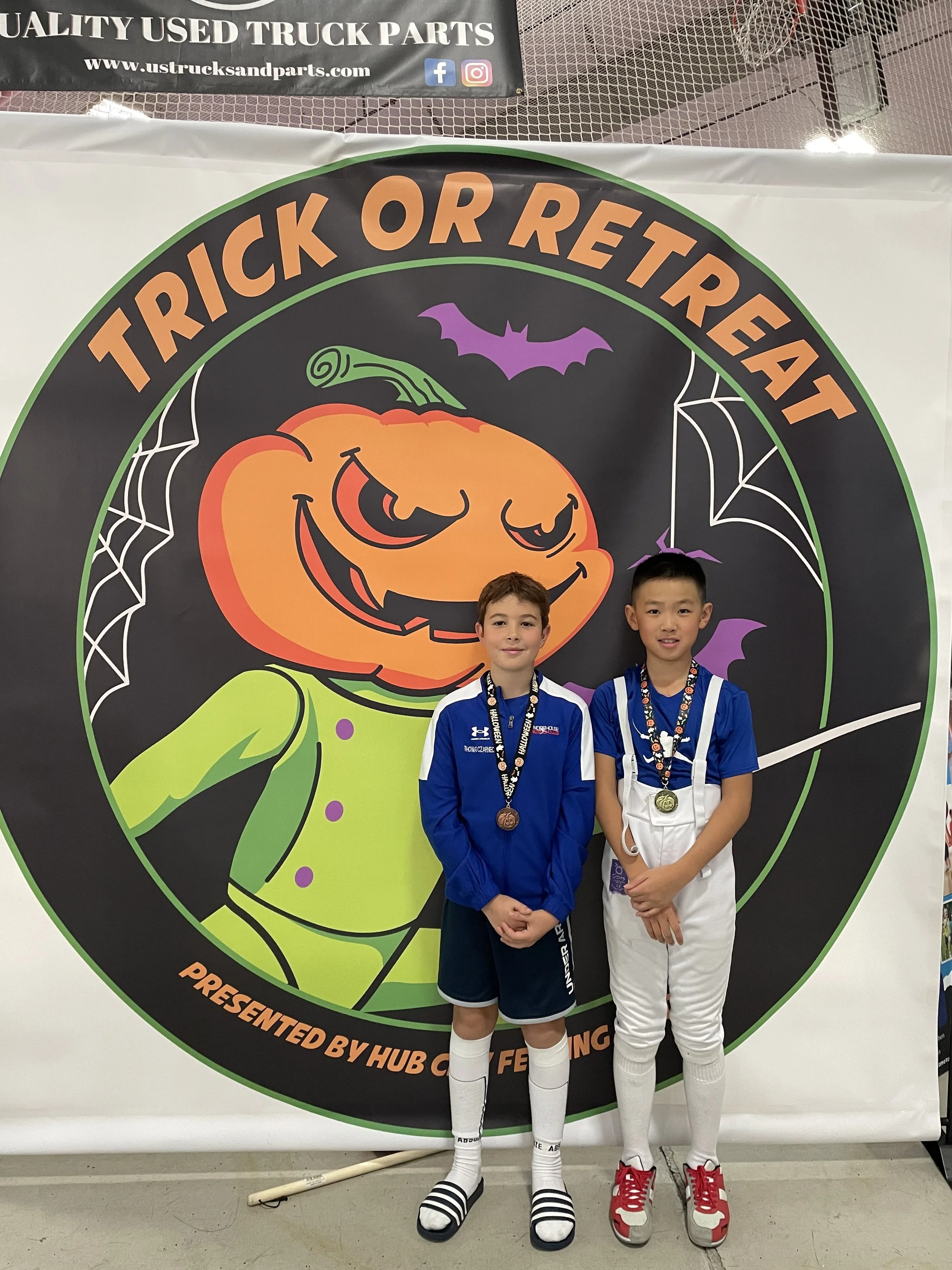 Hauchen Yu Thomas Czarnecki TorRetreat medals.JPG