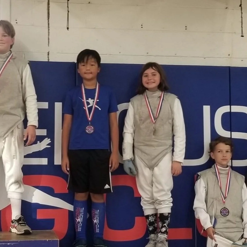 Young Foil Fencers Try Competing for the First Time 