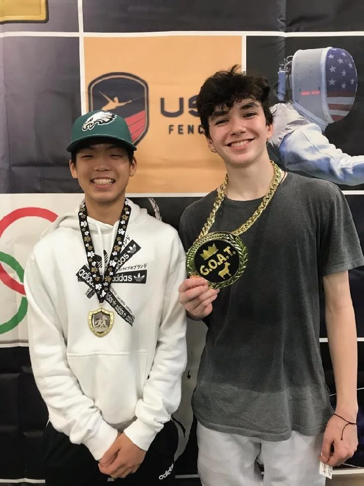 Nickolas Rusadze Jonah Lee Medals Jersey Clash.jpeg