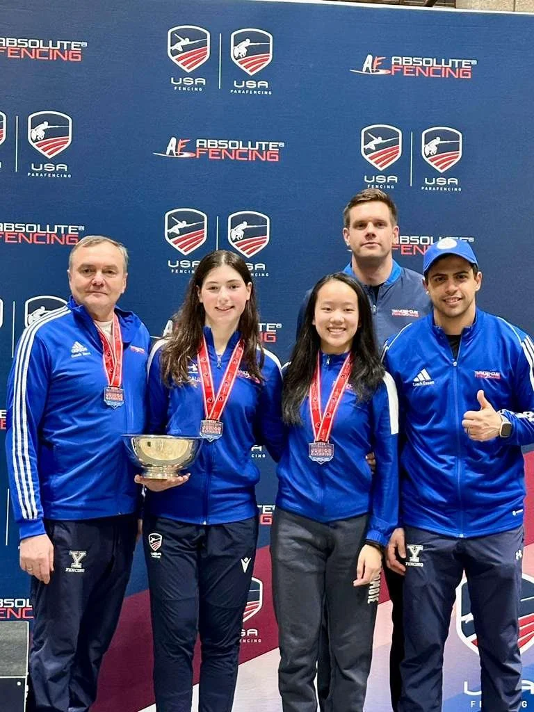 Ella Calise and Grace Feng with Tim morehouse fencing club foil coaches slava grigoriev and Mohammad Essam