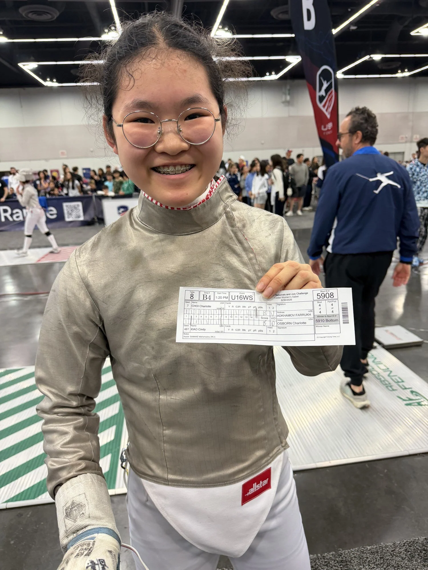 Charlotte Choi with her bronze medal — Cadet Women's Saber, 2026 USA Fencing Summer Nationals