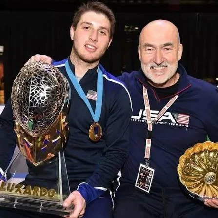 Coach Zoran Tulum with world champion and three-time Olympian Eli Dershwitz