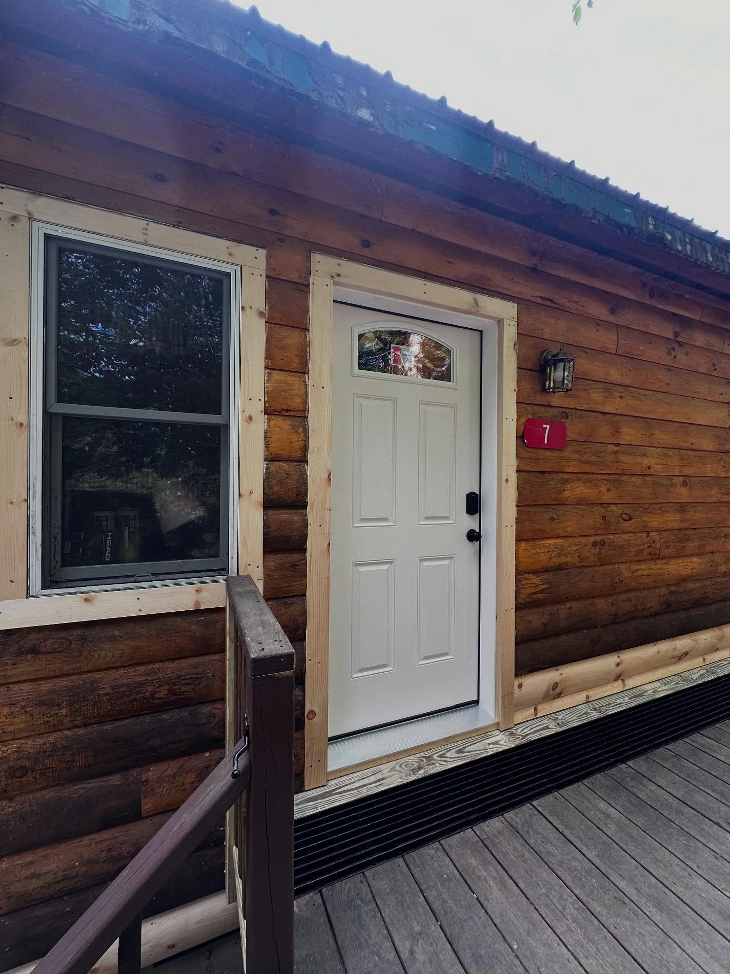 Rot repair, new door and trim, added a deck grate ✅  Wrapped this one up quick so the customer can use their front door again! 
.
.
.
.
🏷️ Rangeley Maine, Oquossoc, Rangeley Lake, Rot Repair, Rangeley Builder, Carpentry, Cabin, Western Maine