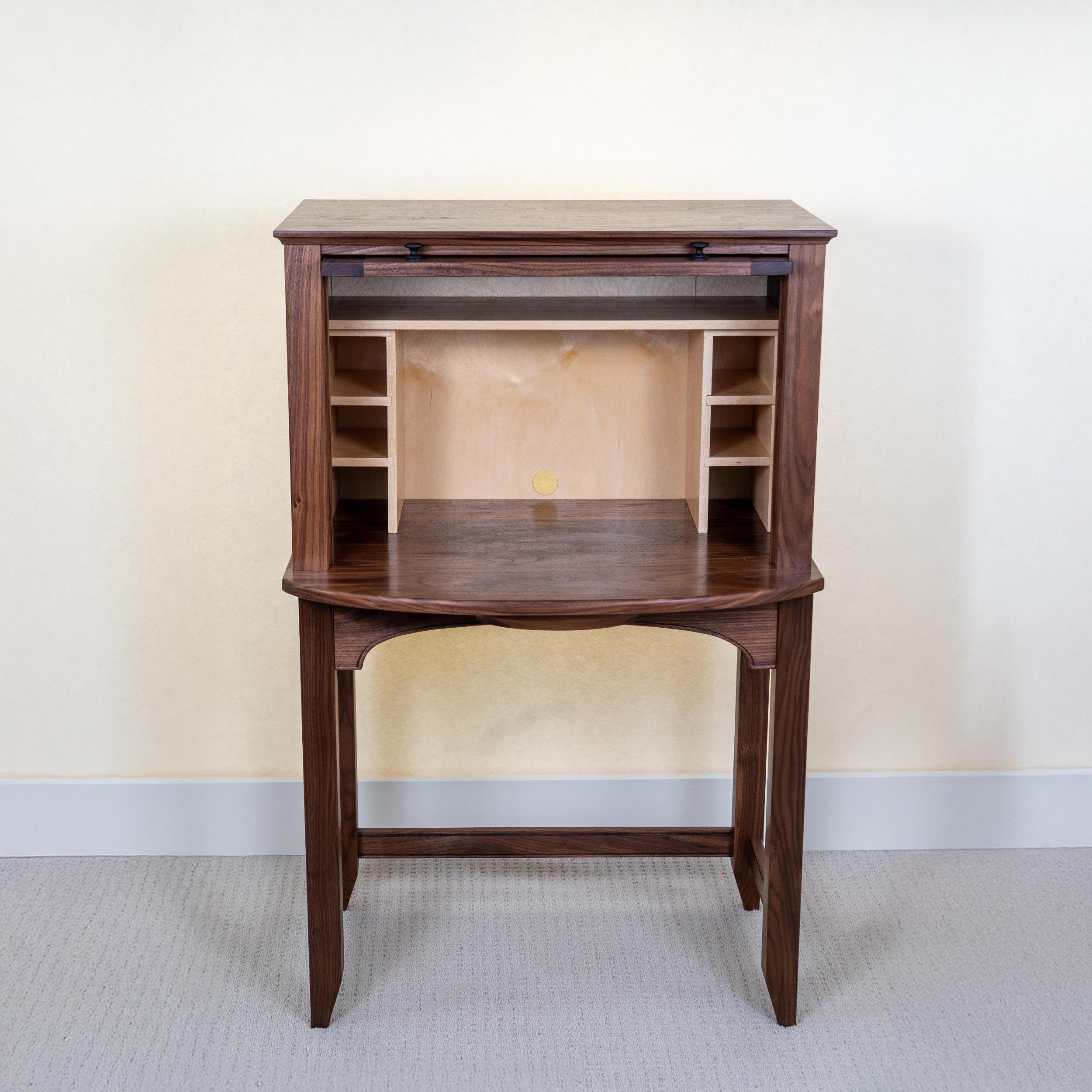 Writing / laptop desk (open)

29” wide, 46.25” high, 16” deep case, 22” deep top, maple interior, shown in walnut

Barrister bookcase style door, writing surface 27” high, various interior layouts available

$ 1890.00 cherry
$ 2090.00 walnut