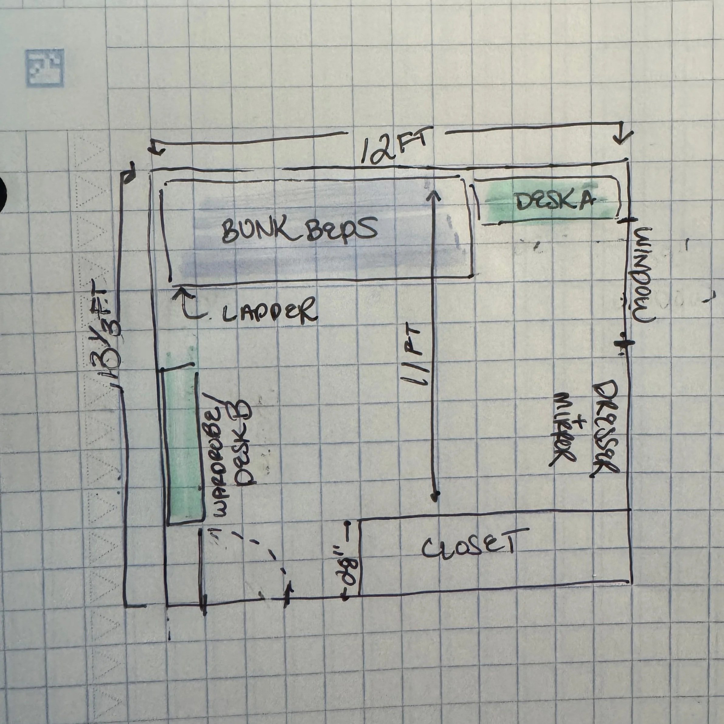 Hand-drawn floor plan on graph paper of a room with a loft, bunk beds, a desk, a clothing rod, a closet, and a window, including measurements and labels.