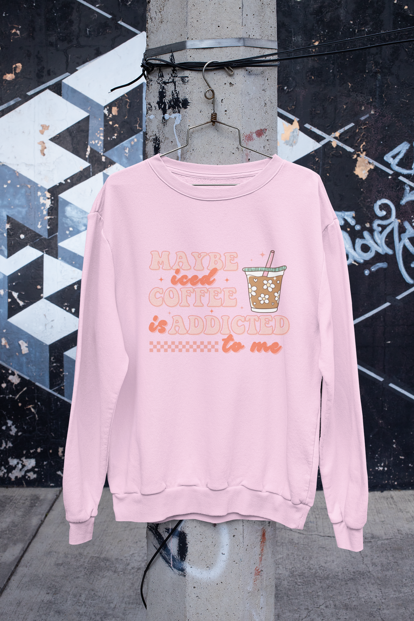 mockup-of-a-crewneck-sweatshirt-hanging-in-an-urban-scenario-m445.png