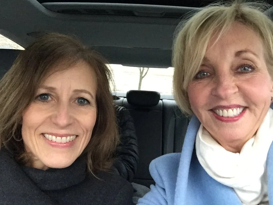 Janell and Barbara smiling in the car