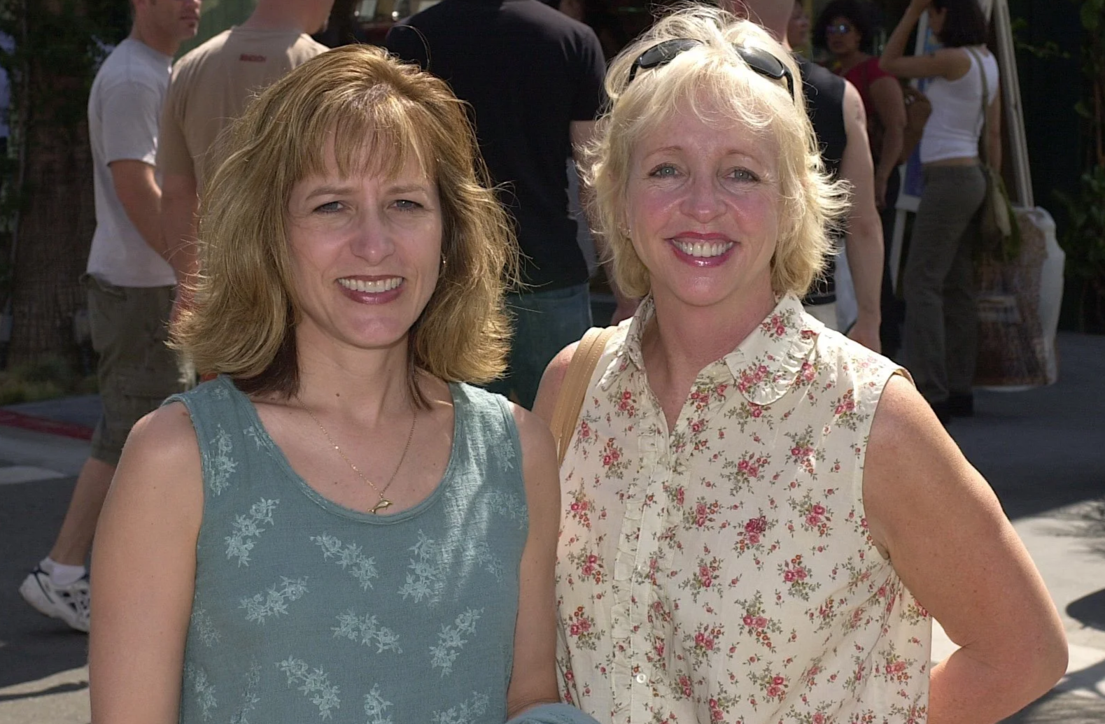 Janell and Barbara in floral shirts in the sun