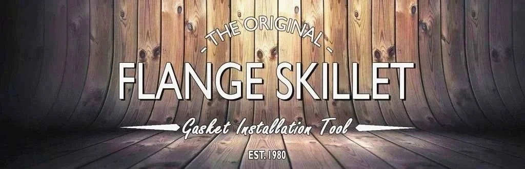 Wooden wall and floor with text promoting the Flange Skillet as a gasket installation tool, established in 1980.