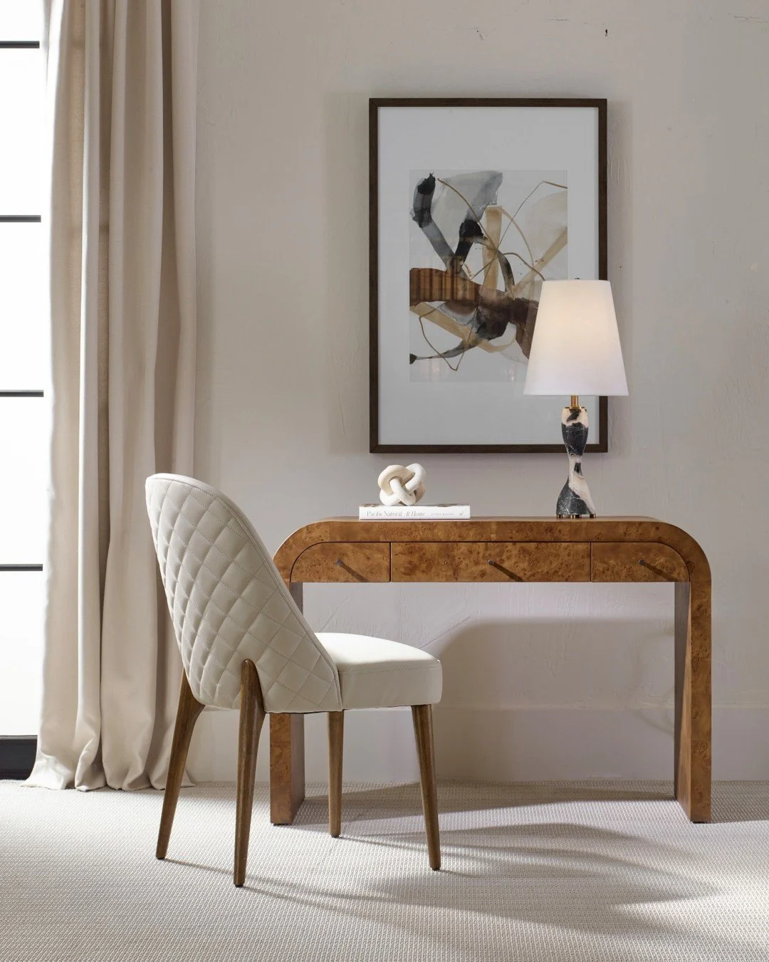 Proof that workspaces should be beautiful too 🤎 The stunning curved silhouette desk design features a mappa burl veneer. Contact us to learn more. http://www.signaturespaces850.com