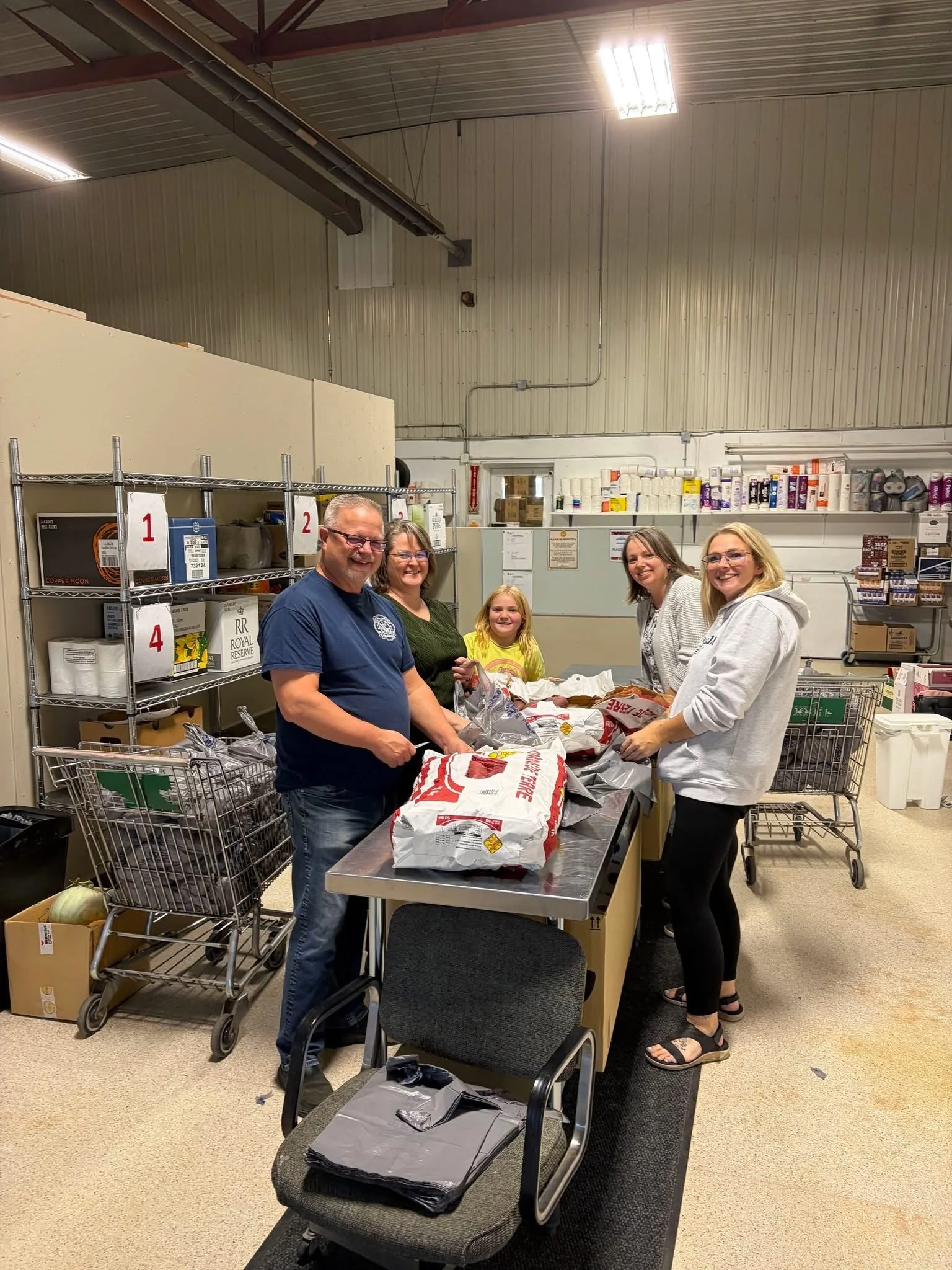 The James Insurance Group volunteering at the Food Bank