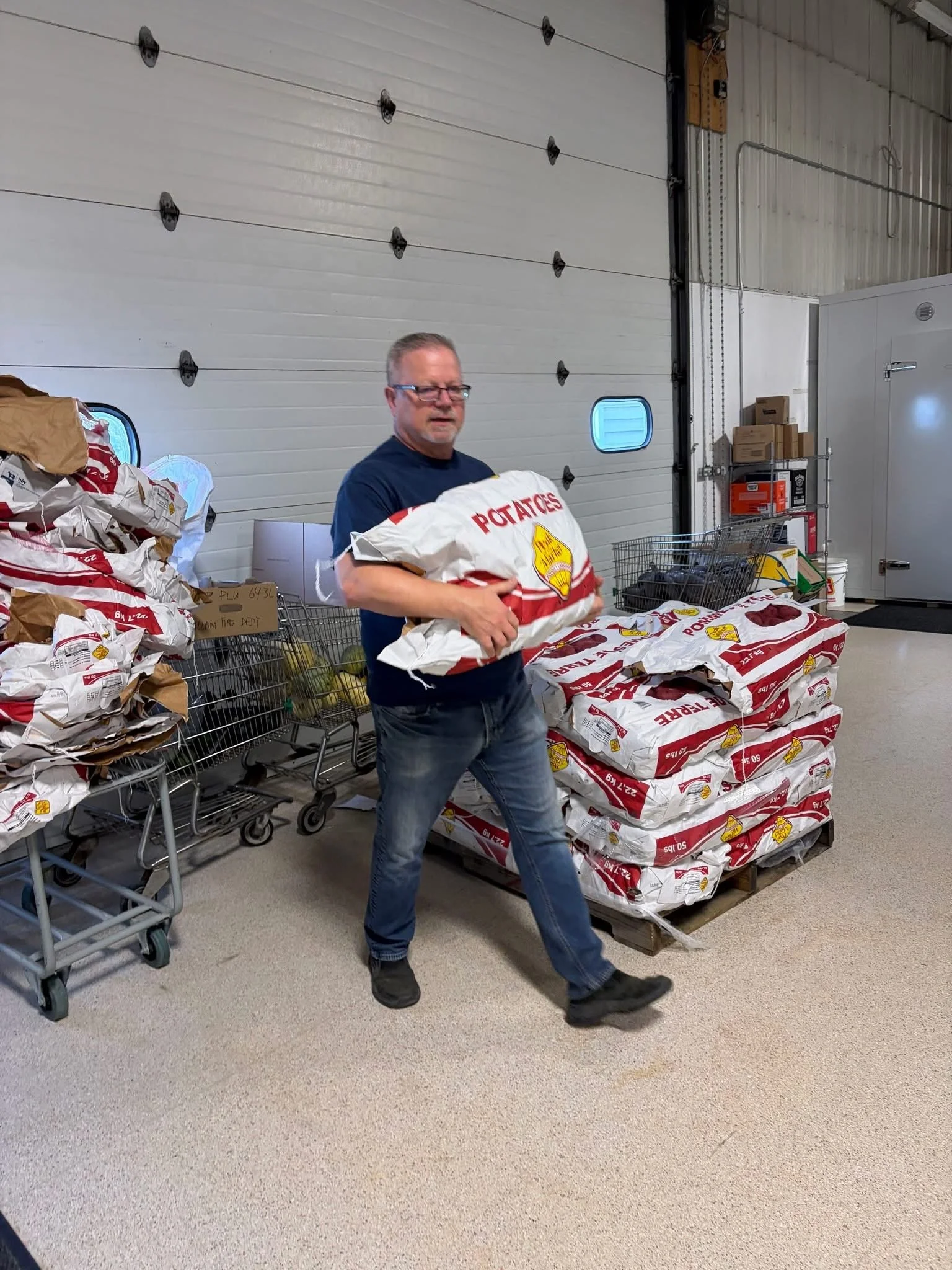 The James Insurance Group volunteering at the Food Bank