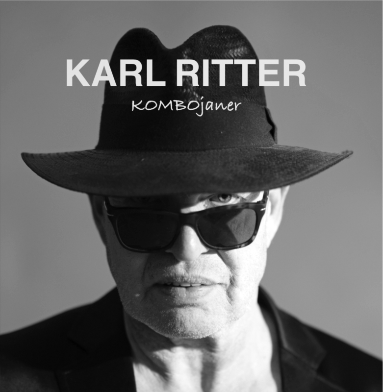 Schwarz-weiß-Fotografie eines Mannes mit Hut und Sonnenbrille, mit Text "KARL RITTER KOMBOjanner"