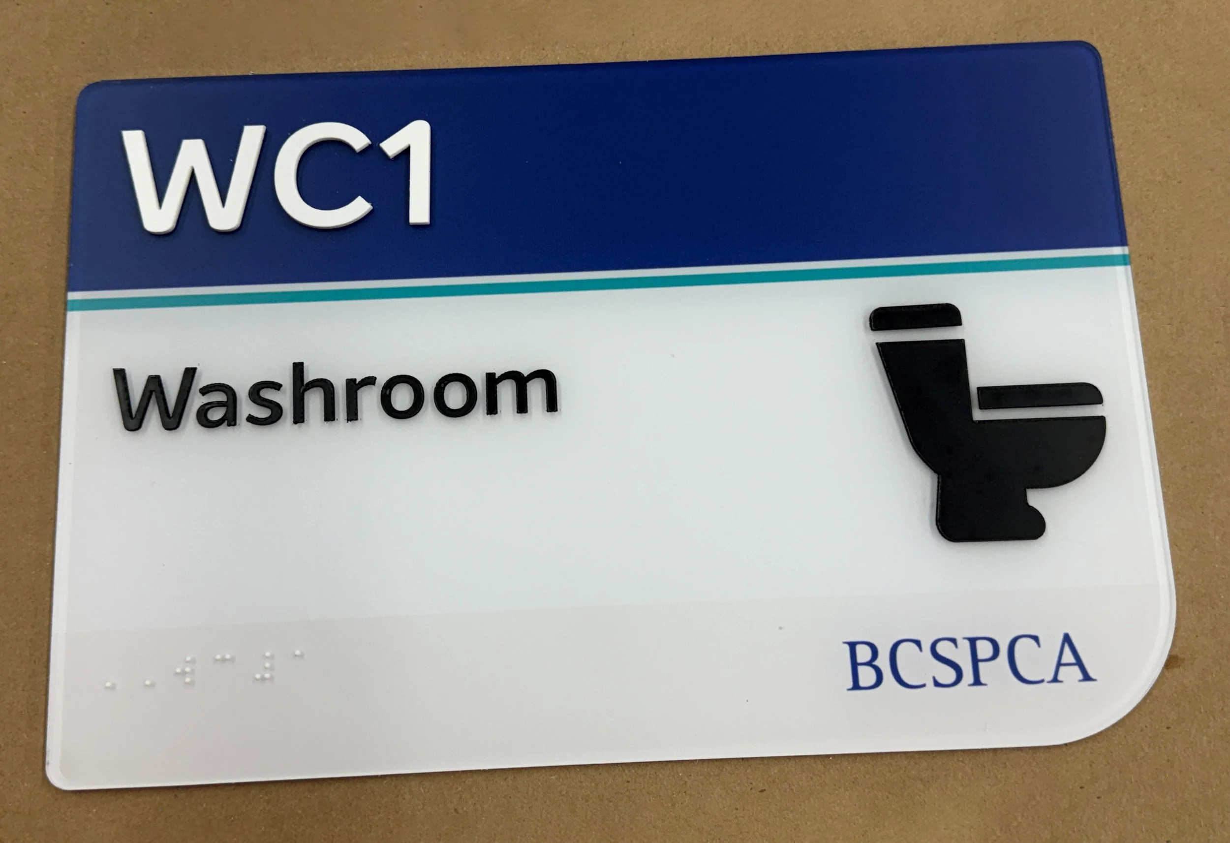 tactile SPCA Signage Interior ADA washroom sign.jpg