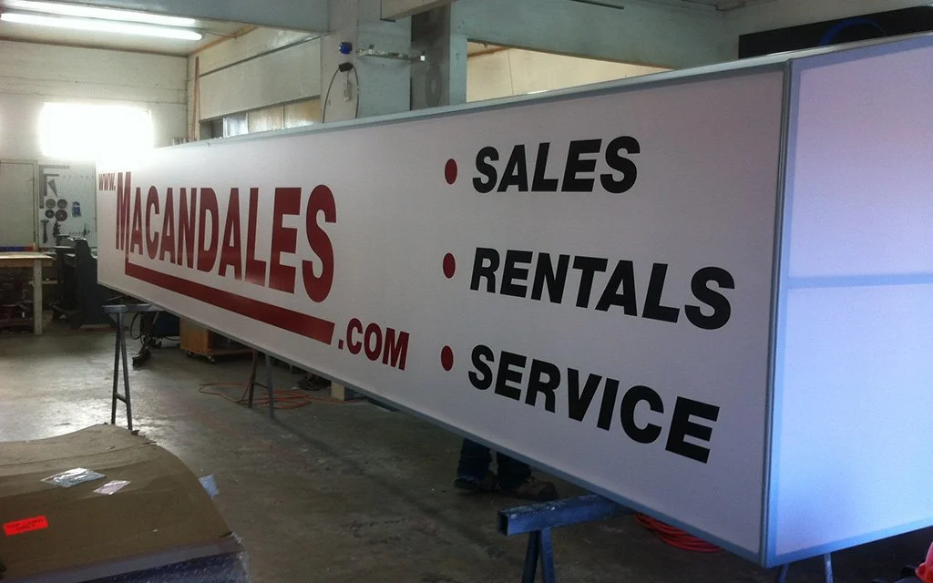 White awnings with replaceable graphics