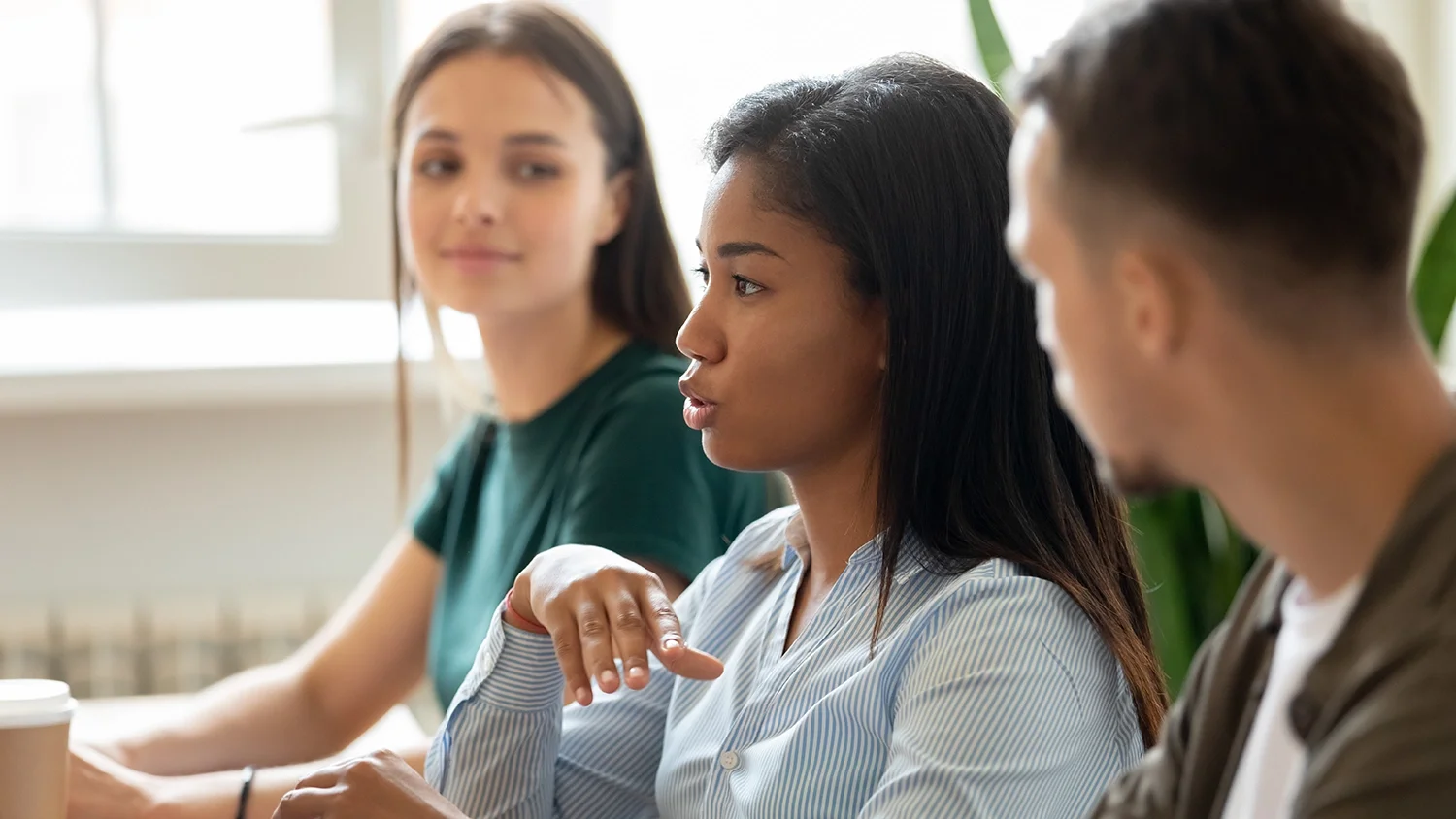 employee talking during a meeting